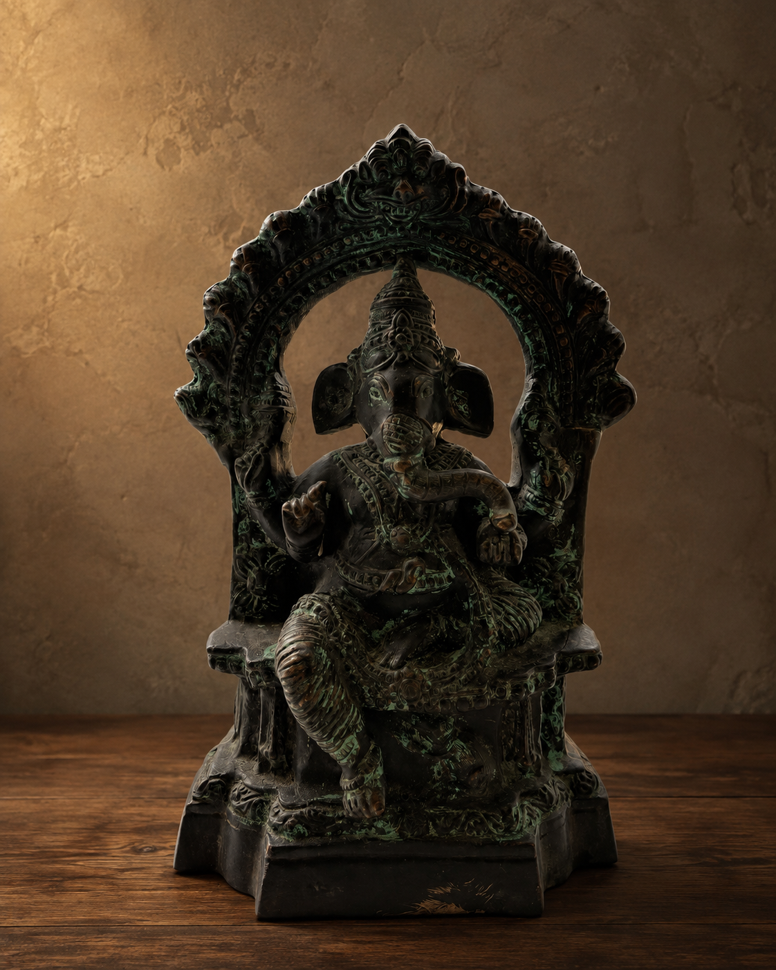 Straight-on front view of the bronze Ganesha temple figure